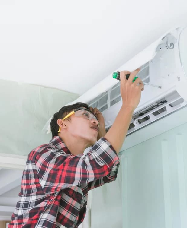 Air Conditioning Repair, Hot and Cool HVAC technician on-site in Calgary