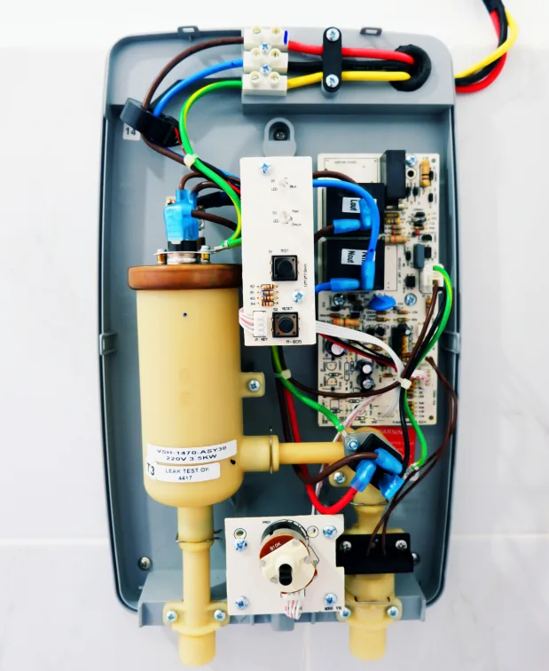 Tankless Water Heater Repair Services, Hot and Cool HVAC technician on-site in Calgary