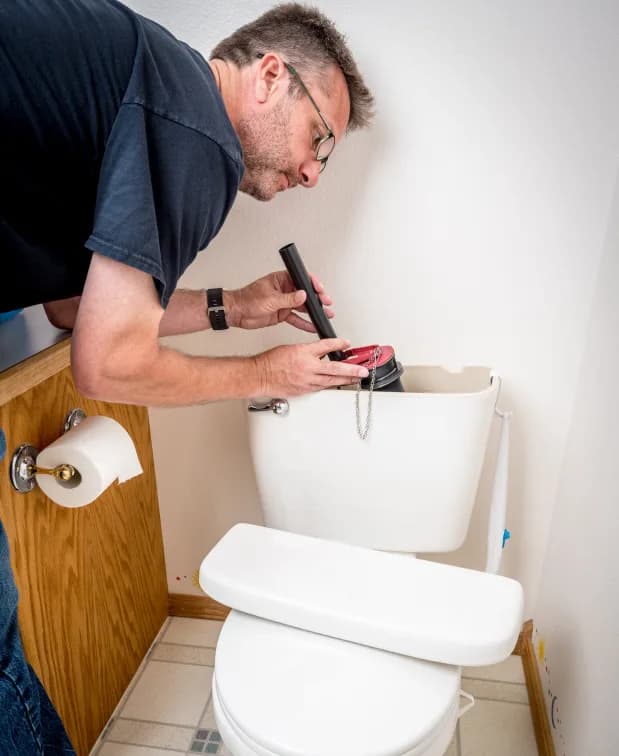 Toilet Repairs & Replacements, Hot and Cool HVAC technician on-site in Calgary